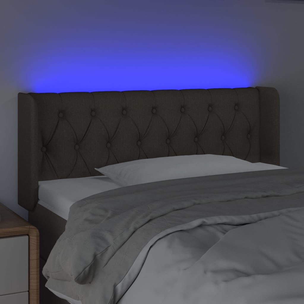 Sänggavel LED taupe 93x16x78/88 cm tyg