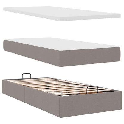 Ottomansk säng med madrass och LED-lampor taupe 90x200 cm tyg